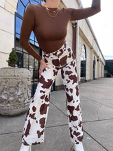 Load image into Gallery viewer, Moovin&#39; On Cow Print Pants